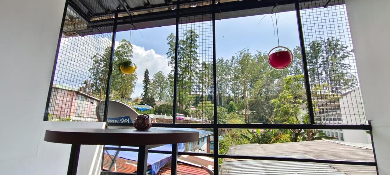 Birdwing Cottage, Munnar Extérieur photo